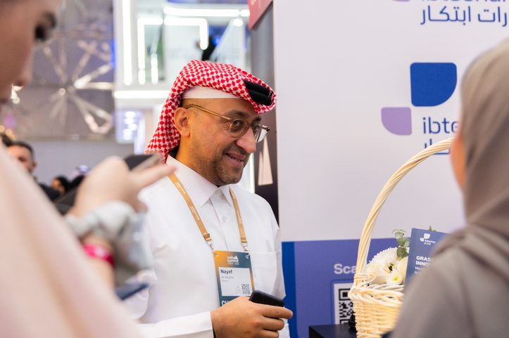 Nayef Al-Ibrahim greeting visitors at the Ibtechar stand at Web Summit Qatar 2026